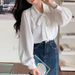Camicia bianca da donna nuova primavera e autunno 2024 con fiocco francese in basso e manica lunga_voghion.com