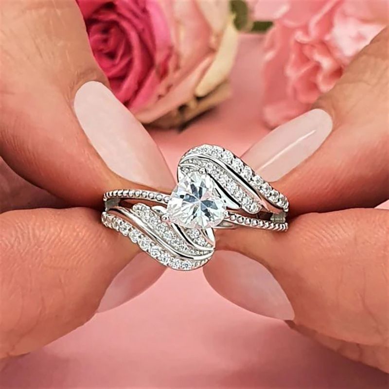 Gioielli unisex Moda anello d'amore design braccio oscillante ali di piume d'angelo a forma di cuore gioielli di moda da donna_voghion.com