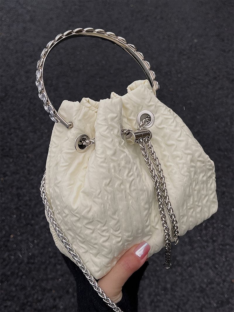Korean version rhinestone chain handbag 2024 fashionable high-end drawstring bucket sweet and niche crossbody bag for_voghion.com