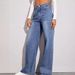 Damenbekleidung – Cat Whiskers And Maliu – Lockere Jeans mit hoher Taille und weitem Bein_voghion.com