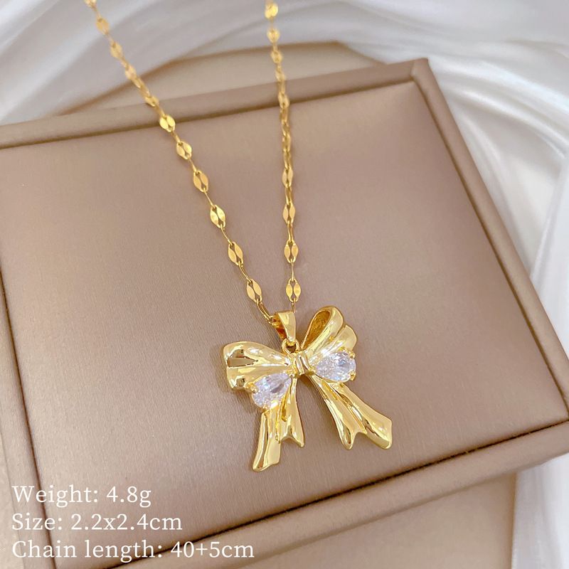 【 Titanstahl 】 Halskette Ohrring Licht Luxus Volldiamant Schmetterling Knoten Zirkon Personalisiertes Temperament Bankett_voghion.com