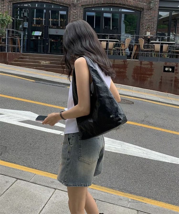 Versione coreana della borsa da donna in pelle Niger Lazy Style Hundred Shoulder Handheld Armpit Bag 2025 Primavera ed estate Nuovi modelli alla moda_voghion.com