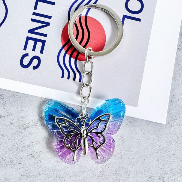 2025 Nuovo portachiavi a forma di farfalla in resina, squisita personalità, creativo, zaino, custodia per auricolari, ciondolo per auto, regalo semplice_voghion.com