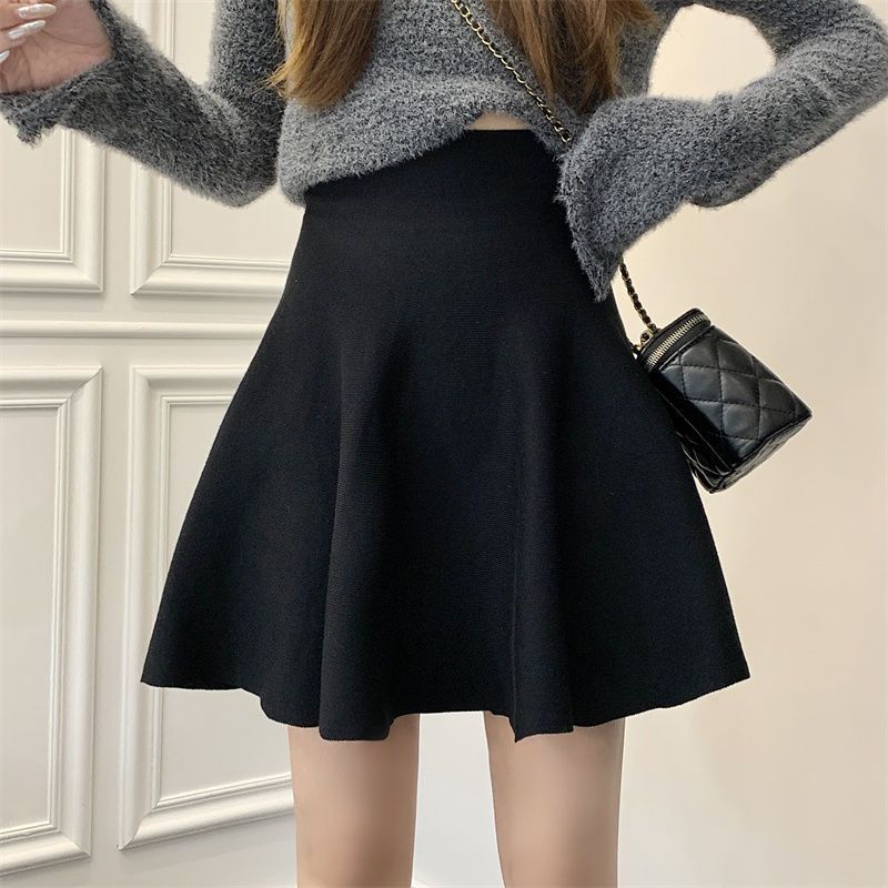 Solid color high waisted A-line knitted half for women, 2024 autumn and winter lazy fluffy pleated umbrella base short_voghion.com
