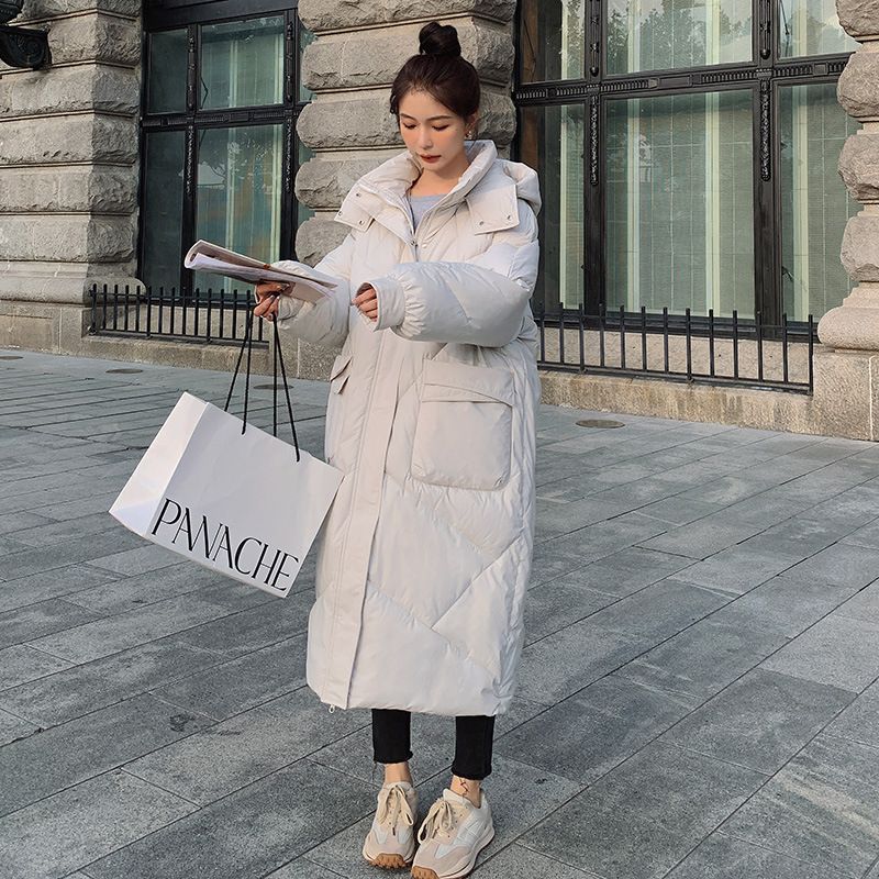 Women's long knee-length cotton-padded jacket Korean loose oversized cotton-padded jacket has a sense of design_voghion.com