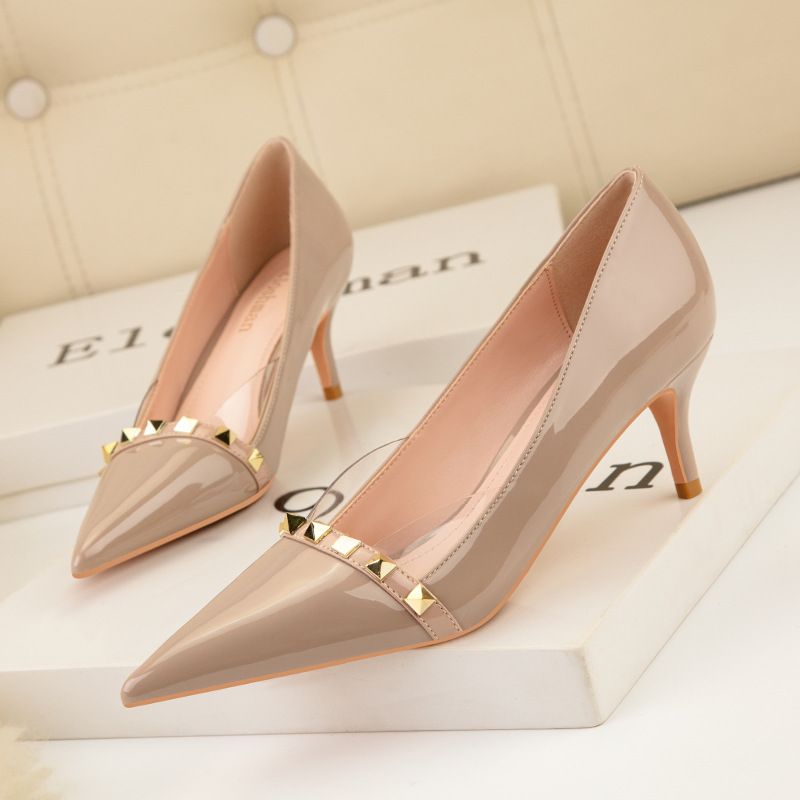 Sexy slim transparent high heels stiletto heels patent leather shallow mouth pointed metal rivets single shoes_voghion.com