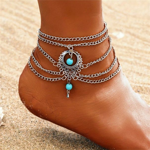 Cavigliera da spiaggia esagerata con nappa turchese geometrica in stile etnico bohémien_voghion.com