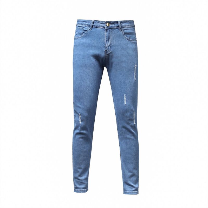 Jeans skinny in denim elasticizzato da uomo consumato con piedi piccoli_voghion.com