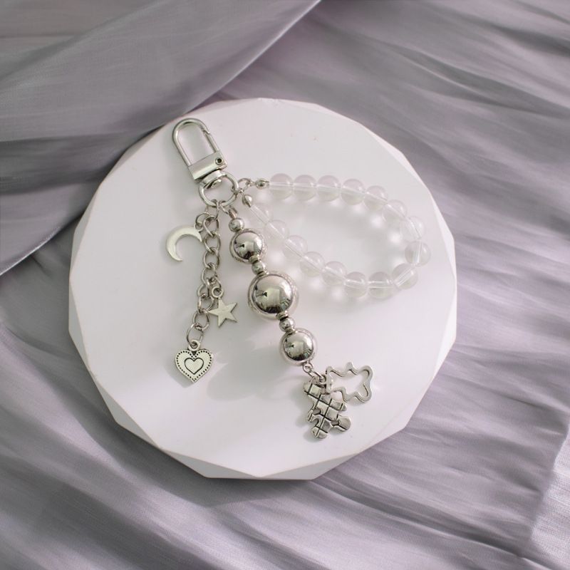 Pērlīšu somas kulona metāla melns balts sudraba lāča sirds krusts automašīnas atslēgu piekariņa dekorācija_voghion.com