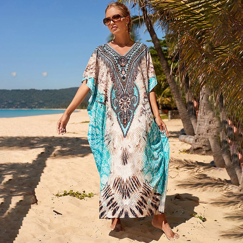 ​​"Bohemian Blue Leopard Print Beach Cover-Up – Flowy Long Skirt & Sun Protection Robe For Resort Wear & Bikini Outerwear"​​_voghion.com