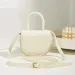 Designer 2025 Niche Design New Female Joker Shoulder Slung Portable Color Retro Saddle Bag_voghion.com