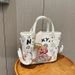 Borsa a mano di grande capacità per le donne 2025 Nuovo stile coreano alla moda versatile Graffiti personalizzati a tracolla Moda cartone animato_voghion.com