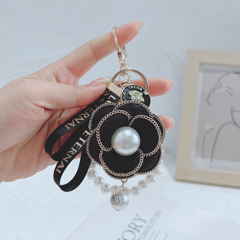 Koreanische Version Perle String Kamelie Modische Personalisierte Tasche Anhänger frauen Auto Keychain Ornament_voghion.com