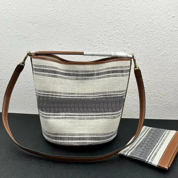 Grey Designer Handbags: Striped Canvas Bucket Shoulder Handbag With Leather Accents & Adjustable Long Strap_voghion.com