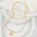 Original high-definition version gold and silver color matching round carved bean chain pearl pendant niche personality sweater chain female advanced_voghion.com