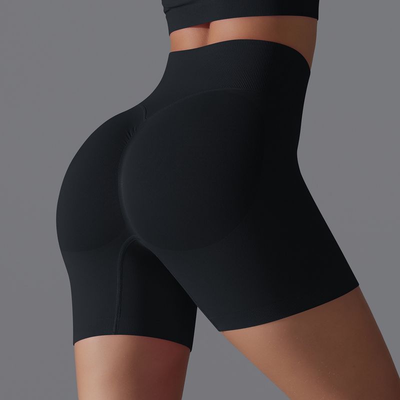 Seamless solid color shorts, tight fitting running fitness yoga suit, high waist lifting buttocks, peach sports pants_voghion.com
