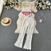 Women's Clothing Spring and summer travel holiday style V-neck tassel suspender tube top + high waist flared pants hook flower two-piece suit_voghion.com