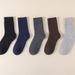 A pair of cold resistant wool socks, thickened socks, men's mid tube socks, winter plus velvet warm terry socks, cashmere socks_voghion.com
