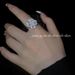 Rotatable Light Luxury High-end Full Diamond Flower Open Fashion Personality Rotating Niche Design Ring_voghion.com