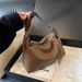 2024 new large capacity women's commuting pillow niche tote bag, French minimalist single shoulder crossbody bag_voghion.com