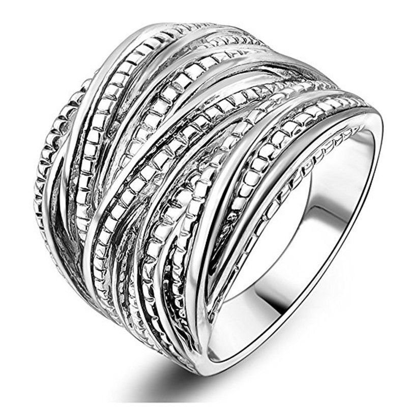 Tocado de anillo exagerado de moda universal con doble textura dorada de Cao Shi para hombres y mujeres_voghion.com