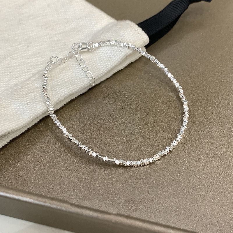 Braccialetto di perle d'argento rotte con design di nicchia di lusso leggero 2023 nuovo temperamento gioielli impilabili in argento ins_voghion.com