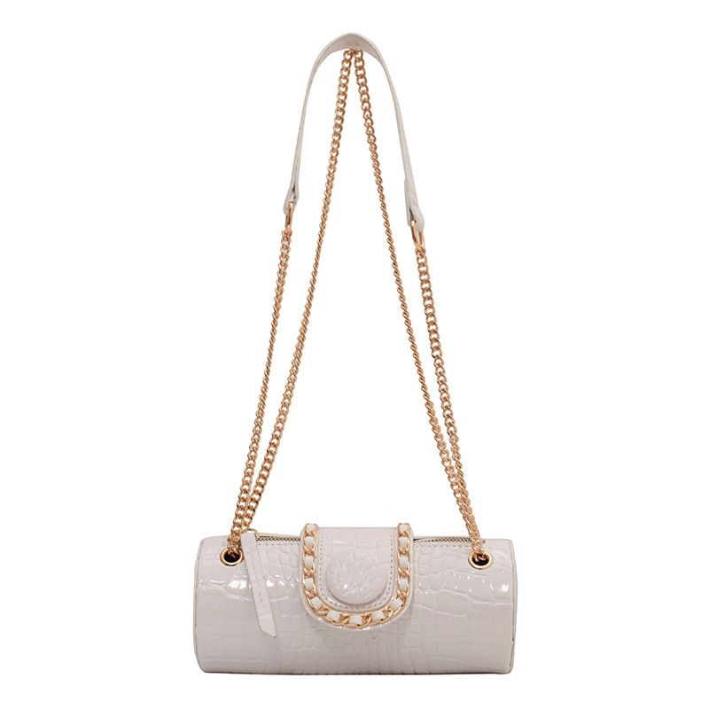 Design di nicchia della moda quest'anno: borsa a secchiello rotonda con catena e motivo a pietra, popolare tra le donne_voghion.com