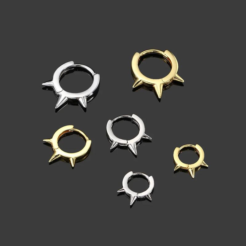 Unisex beliebte Punk Nieten runde Ohrringe für Frauen mit glatten Zirkon Piercing Ohrringe Ohrringe_voghion.com