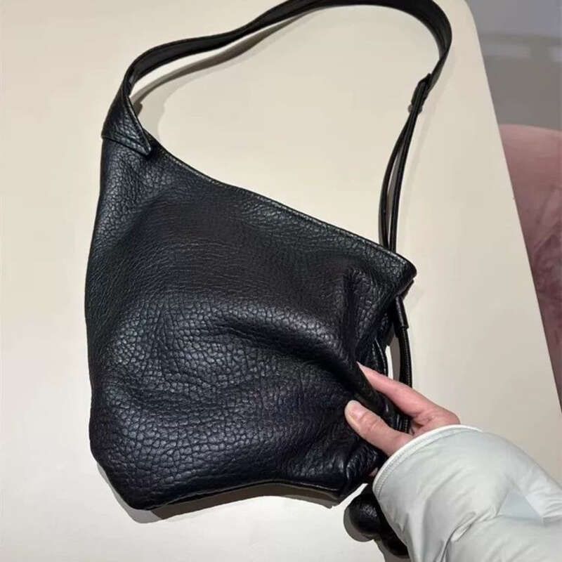 2025 Spring And Summer New High Quality Soft Leather Fashion Versatile Western Style Irregular Design Commuter Shoulder Bag Leisure Daily_voghion.com