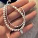 Light luxury niche design broken silver pearl bracelet 2023 new temperament silver stacking hand jewelry ins_voghion.com