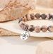 Pulsera de cuentas de piedra natural para mujer, colgante de brújula de piedra de cebra, gesto de cuerda de mano_voghion.com