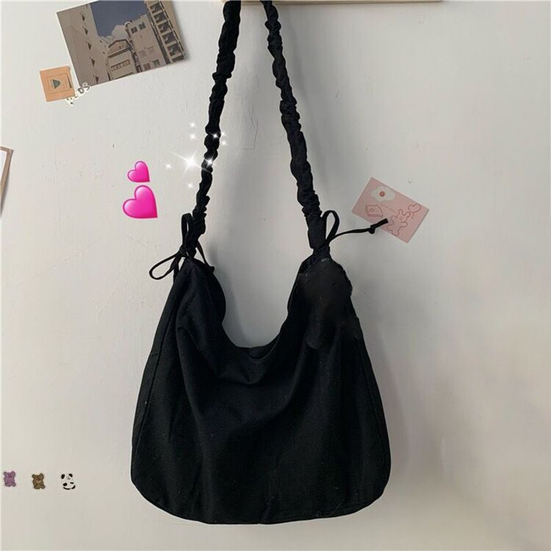 Korean backpack personality single shoulder artistic versatile ins crossbody canvas bag simple pleated student designer_voghion.com