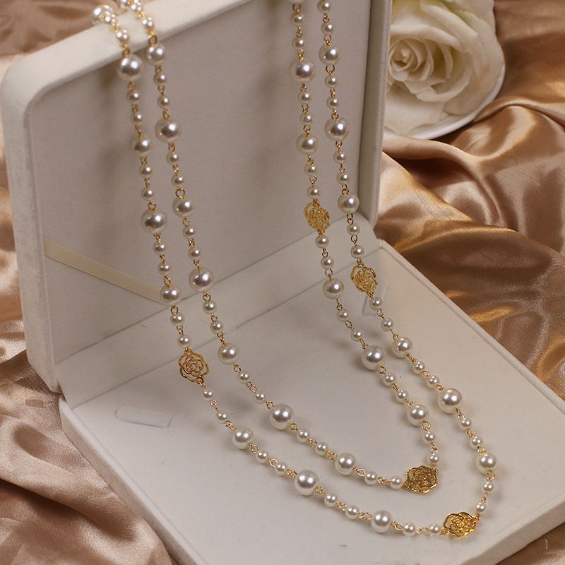 Xiaoxiangfeng hollowed out camellia pearl sweater chain women's long necklace clothing pendant_voghion.com