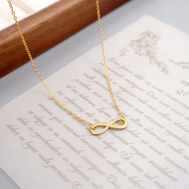 Collana all'ingrosso in stile vintage, fatta a mano, stile semplice, in acciaio inossidabile 304 placcato oro, con ciondolo a forma di infinito_voghion.com