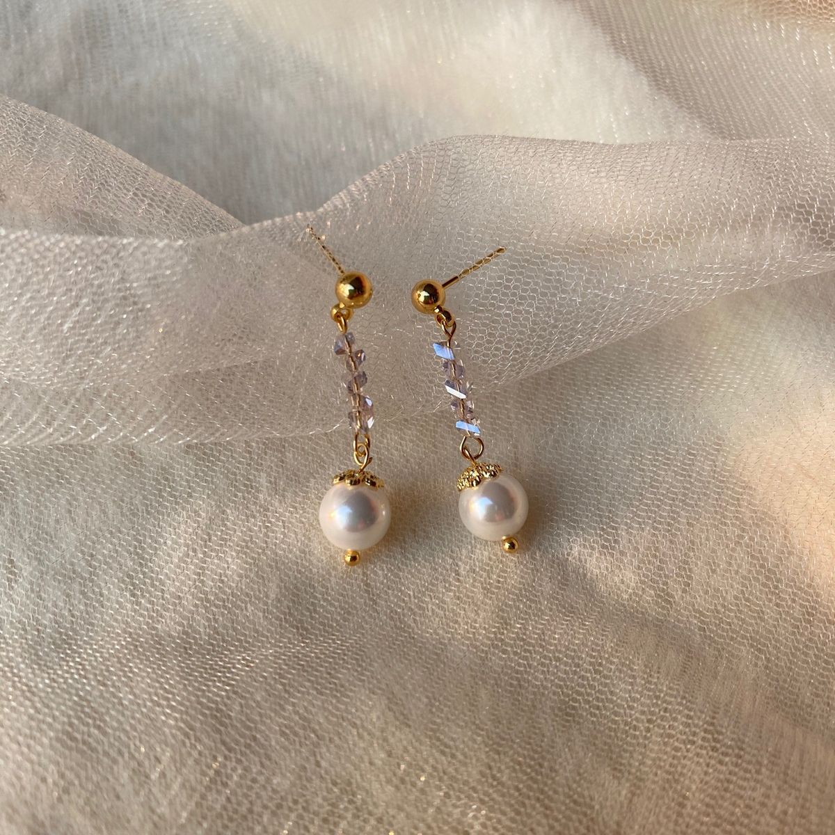 Collana irregolare di ametista grigia Bracciale di perle di conchiglia Orecchini semplificati in edizione coreana Set di gioielli in tre pezzi_voghion.com