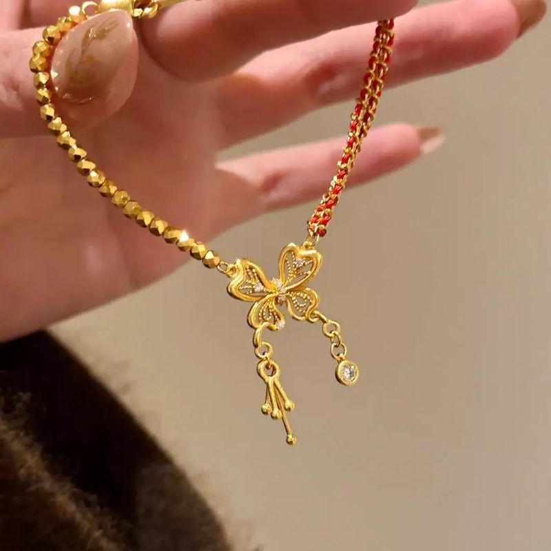 Bracciale in corda rossa con farfalla cava, metodo antico cinese, nuovo modello 2025, placcato in oro, elegante e versatile, design di nicchia_voghion.com