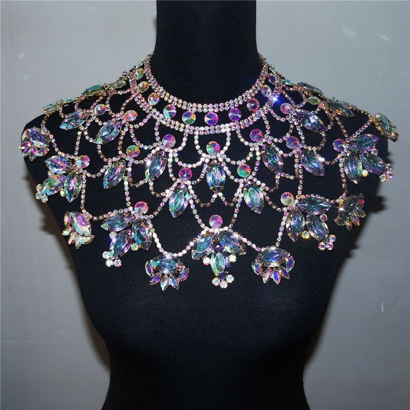 Water droplet shaped with exaggerated atmospheric design, full diamonds and multiple layers of pendants, necklace_voghion.com