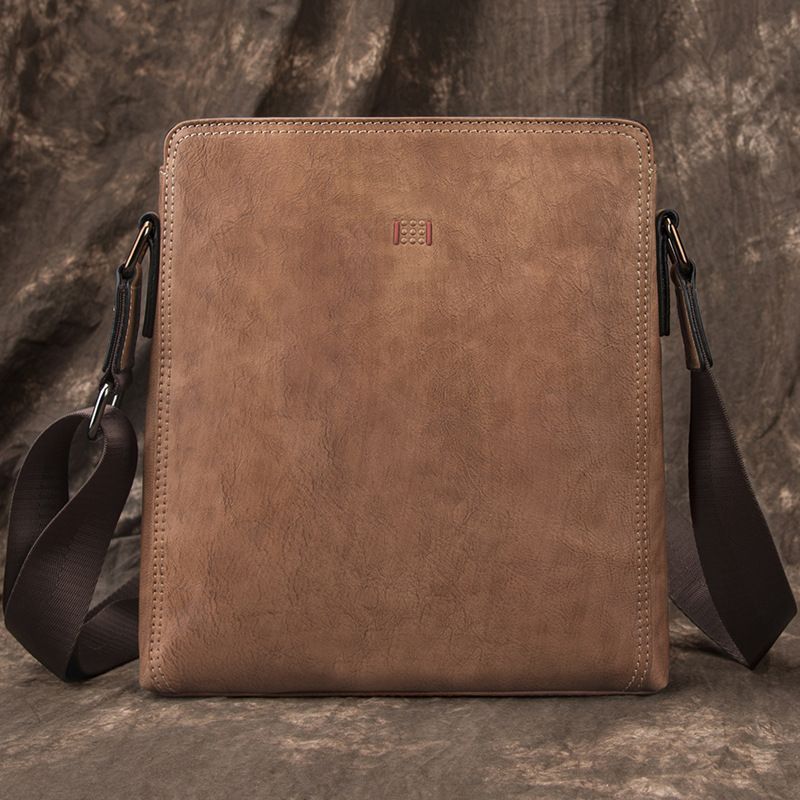 New leather top layer cowhide backpack men's single shoulder crossbody hanging bag diagonal cross casual_voghion.com