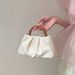 2024 Korean version new wooden handle pleated cloud small handheld women's bag, single shoulder crossbody mini bag_voghion.com