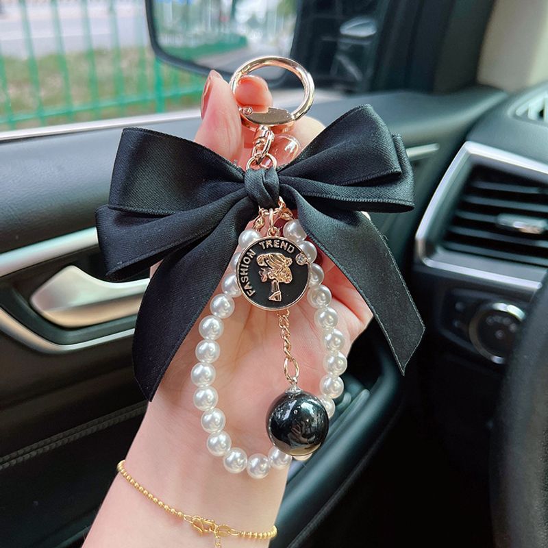 Fashion Big Bow Tie Pearl Chain Women's Car Keychain Pendant Personalized Handbag Decoration_voghion.com