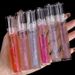Rossetto da donna Water Gloss, idratante, nutriente, trasparente, olio per labbra, luccicante, perlescente, in vetro._voghion.com