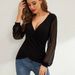 Abbigliamento da donna Elegante camicetta con maniche a lanterna in pizzo francese - Top tunica ampio con scollo a V e incrocio sul davanti per donna_voghion.com