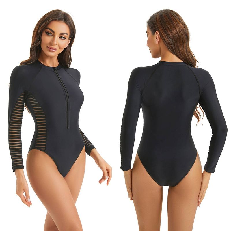 Traje de baño sexy europeo y americano de una pieza, color sólido, manga larga con malla con cremallera ahuecada, traje de surf de alta gama para mujer_voghion.com