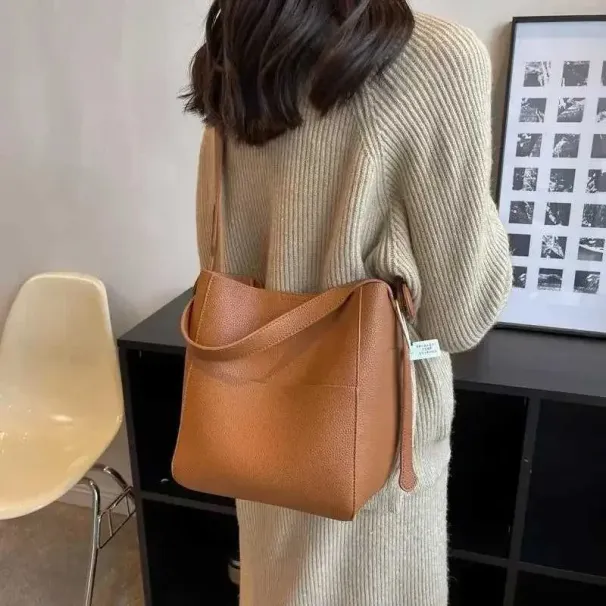 Dames bucket shoulder 2024 vrouwelijke designer trend kleine leren cross body tas portemonnee en handtas Y241121_voghion.com