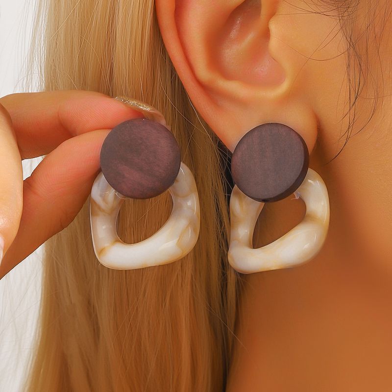 Bohemian geometric circular for women with a sense of luxury, exaggerated and atmospheric, ear, artistic wooden_voghion.com