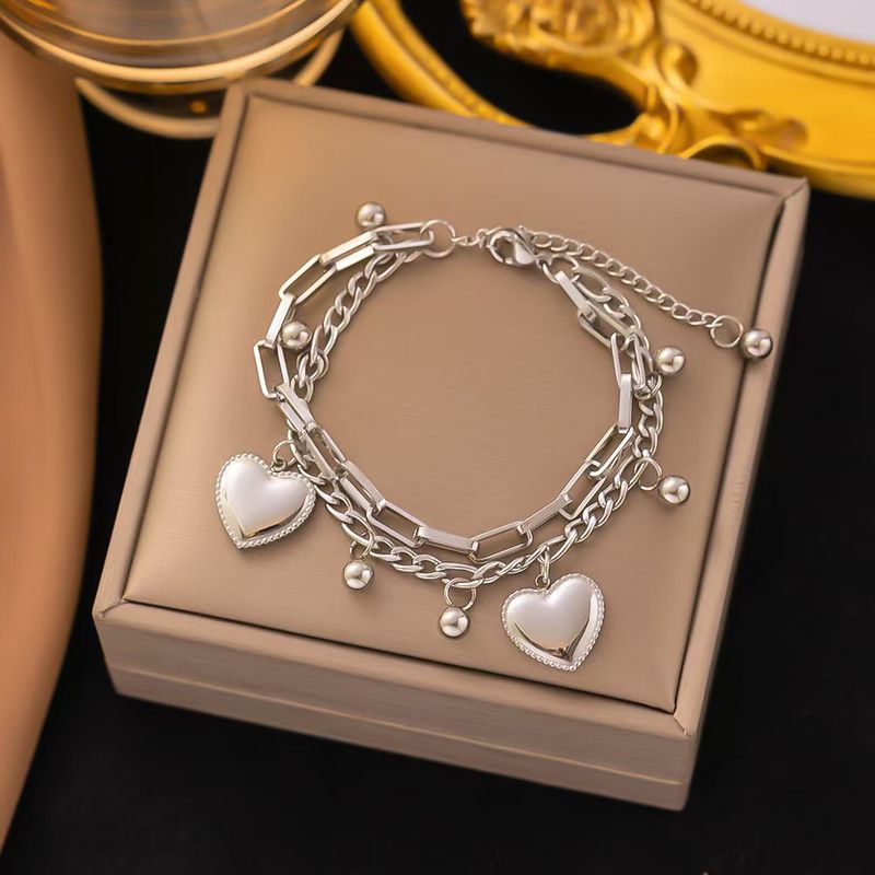Bracciale a doppio strato con cuore 2024 color oro titanio + acciaio_voghion.com