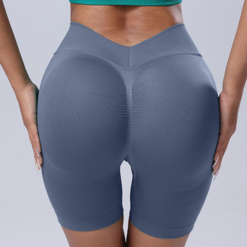 New Seamless Back V Peach Hip Lift Tight Fitness Sports Summer Cycling Quick-Dry Yoga Three-Quarter Shorts_voghion.com