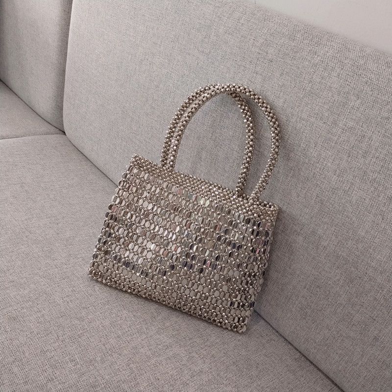 Borsa a tracolla con paillettes e perle, in tessuto metallico lucido intrecciato a mano, per donna_voghion.com