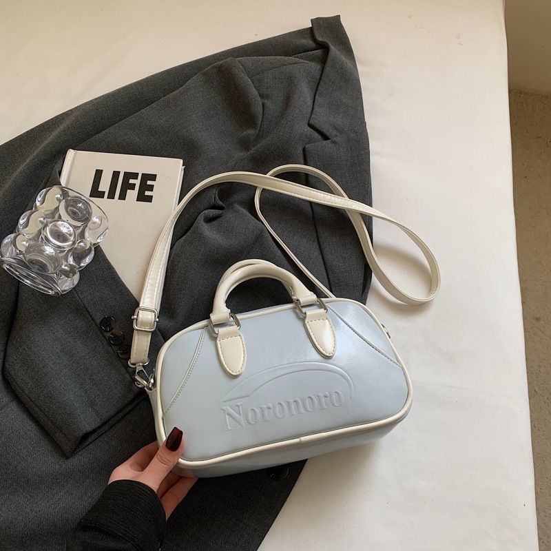 Borsa da bowling portatile di nicchia da donna, nuova, semplice e versatile, borsa a tracolla con cuscino di colore a contrasto_voghion.com