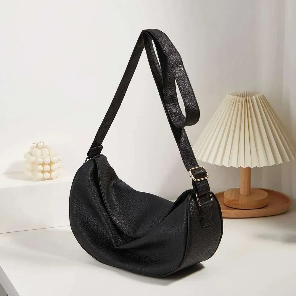 Designer 2025 Neue Net Red Einfache Joker Handtasche Große Kapazität Tote Cross-Body Knödel Tasche_voghion.com